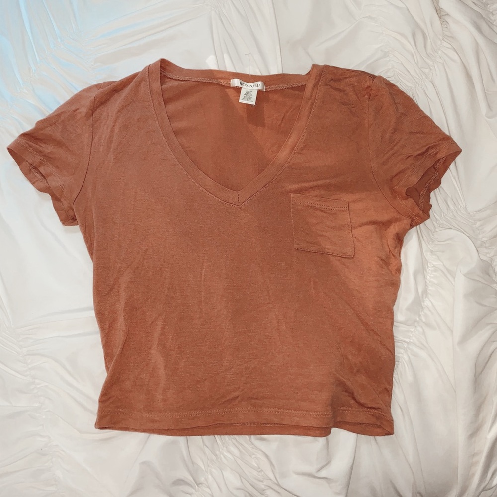 orange short sleeved top